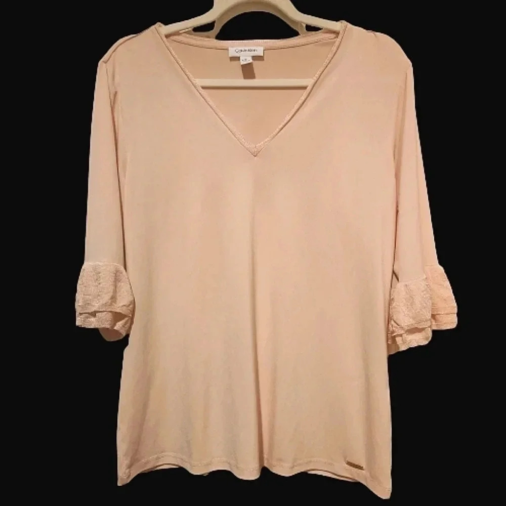 Calvin Klein light pink V neck blouse with delicate ruffle cuffs Size Medium